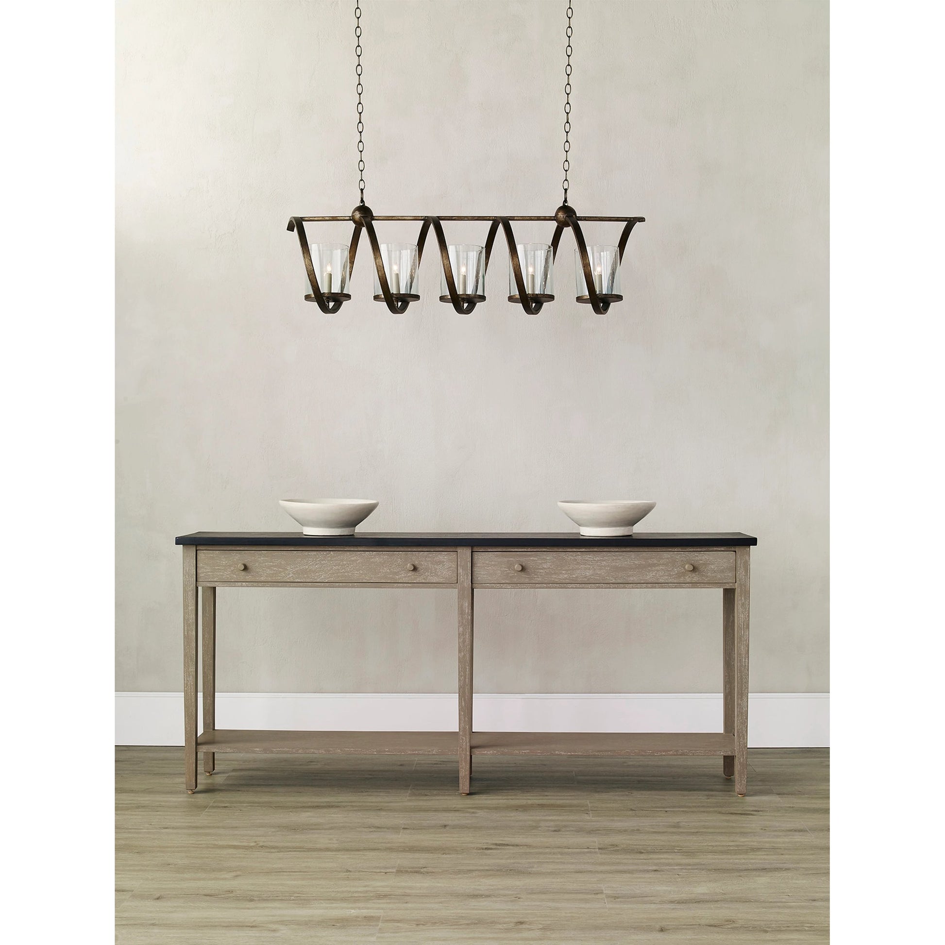 Maximus Chandelier by Currey and Company. Made from wrought iron, glass in a modern style.