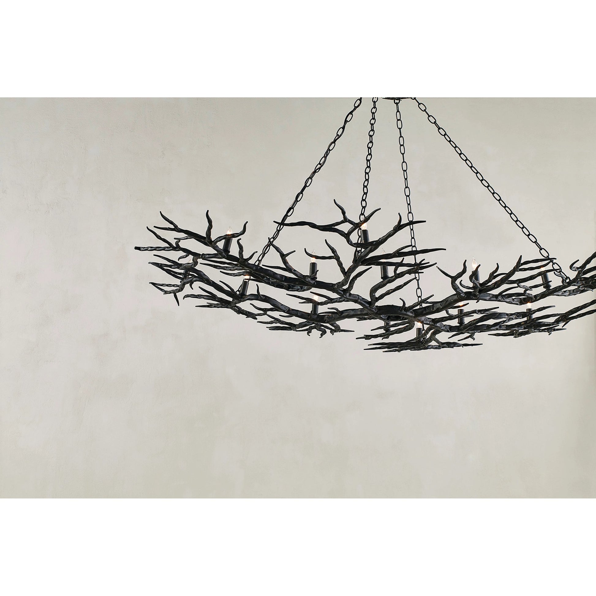 Rainforest Chandelier by Currey and Company in rustic bronze. Made from unique in a rustic style.