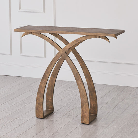 Saigon Console by Global Views in antique brass. Made from cast aluminum in a transitional style.