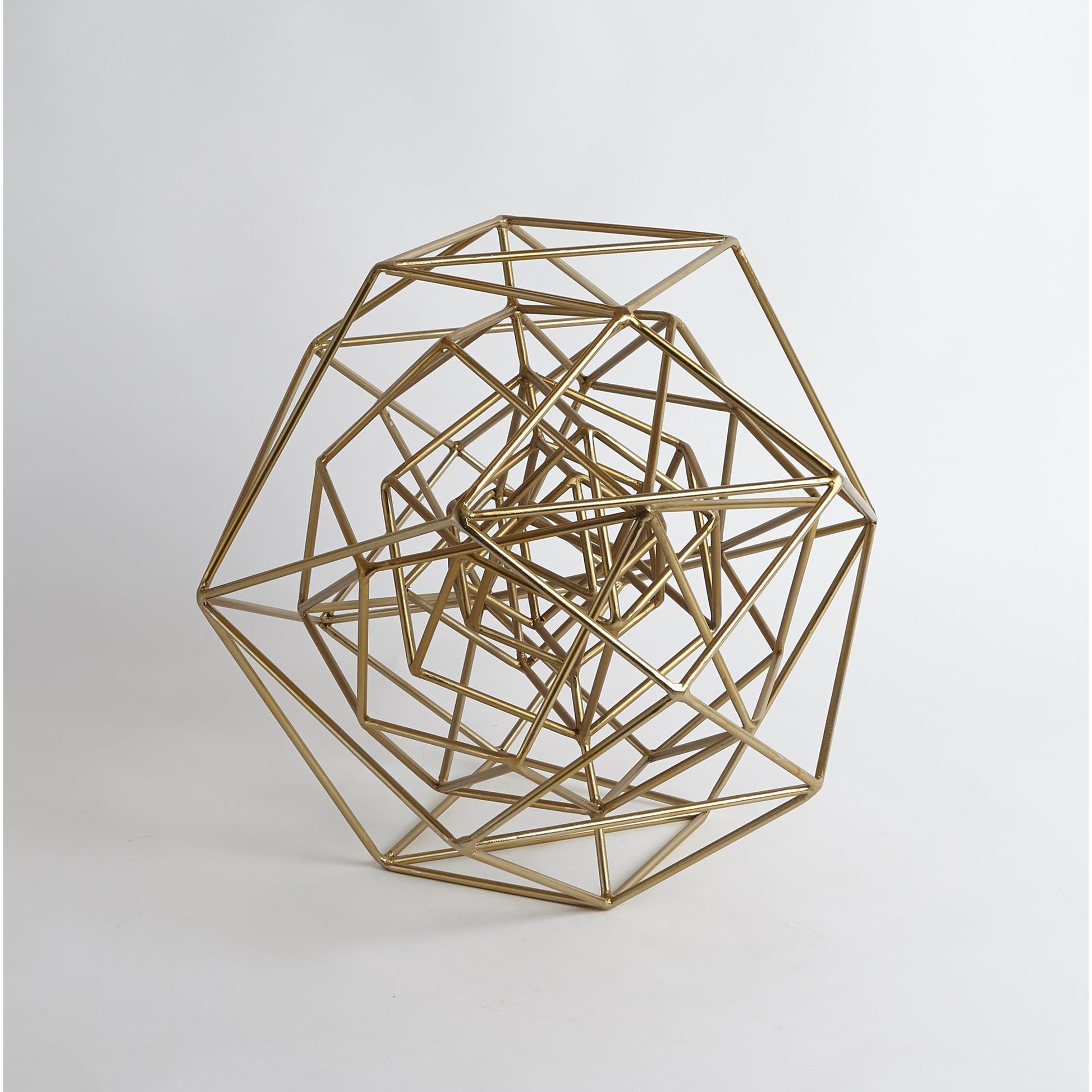 Geo Sculpture by Global Views in gold. Made from iron in a modern style.