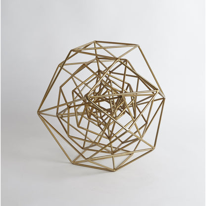 Geo Sculpture by Global Views in gold. Made from iron in a modern style.
