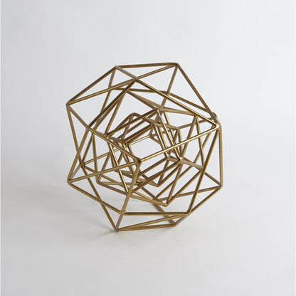 Geo Sculpture by Global Views in gold. Made from iron in a modern style.