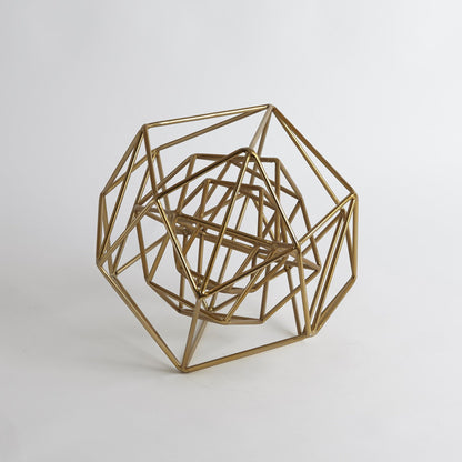 Geo Sculpture by Global Views in gold. Made from iron in a modern style.
