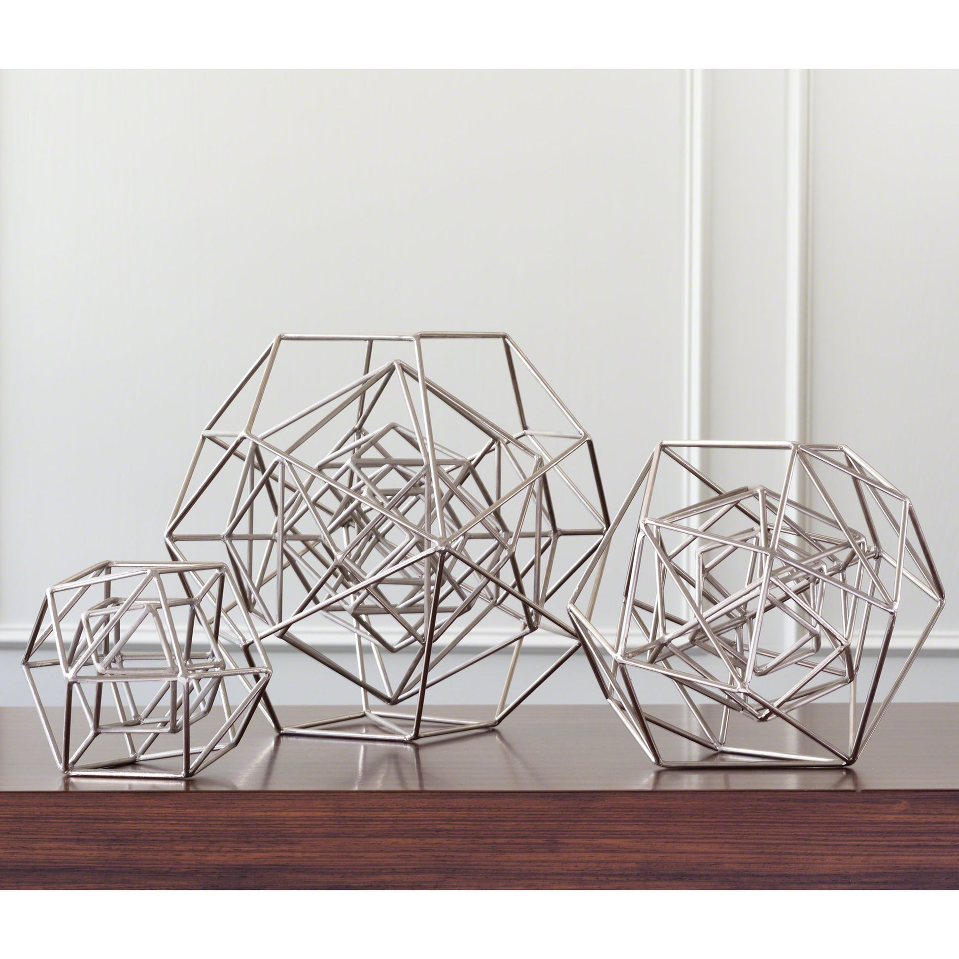 Geo Sculpture by Global Views in gold. Made from iron in a modern style.
