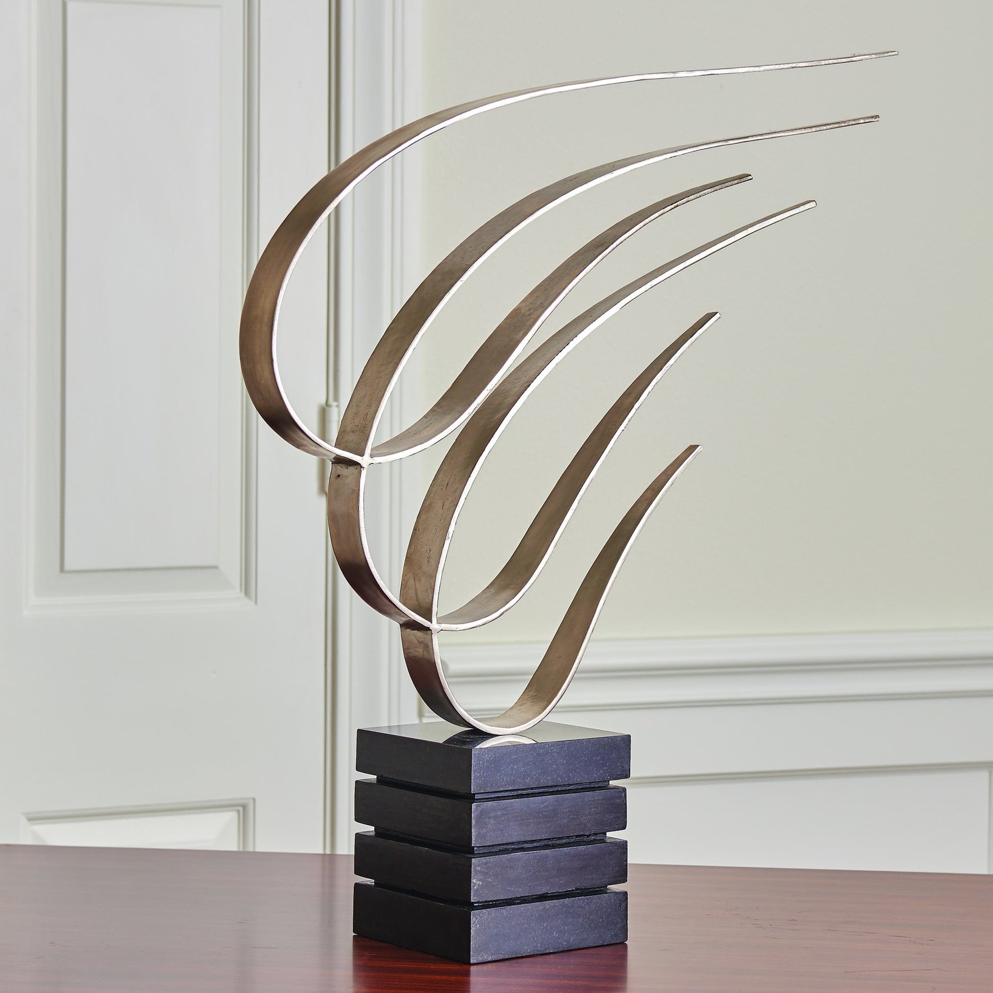 Swoosh Sculpture by Global Views. Made from unique in a eclectic & global style.