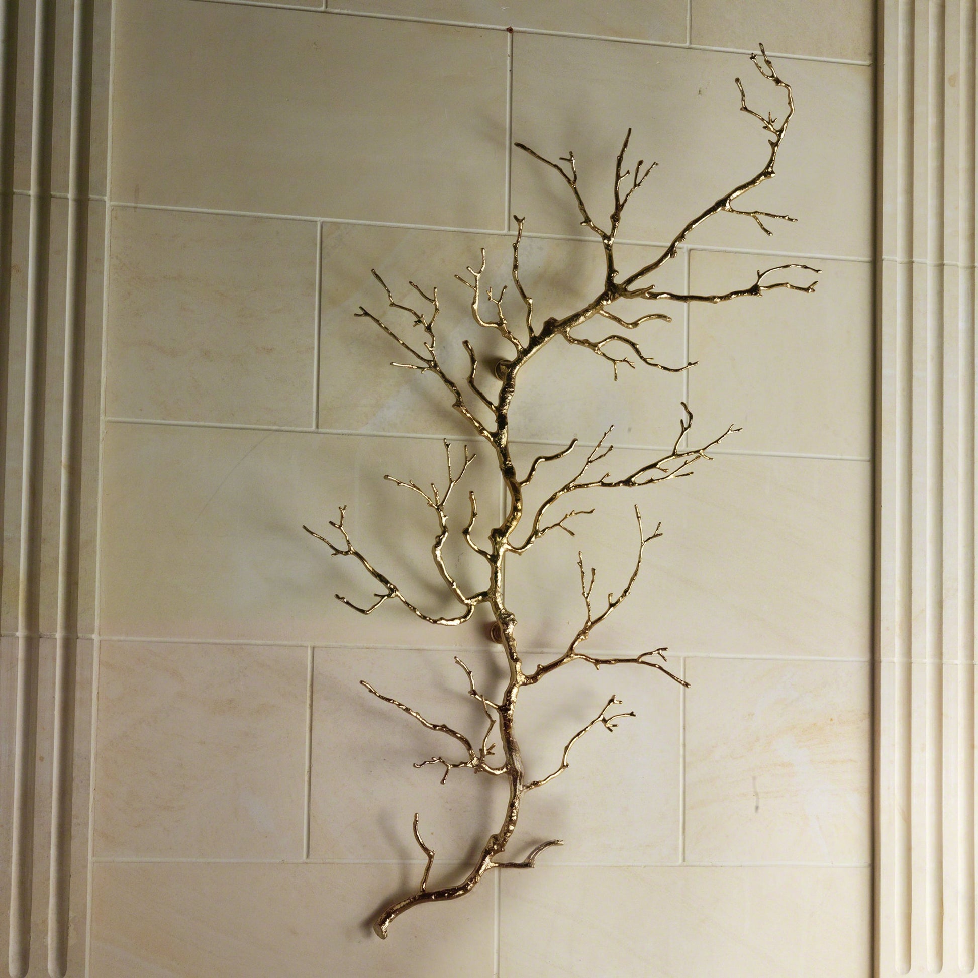 Twig Wall Art by Global Views. Made from brass in a modern style.