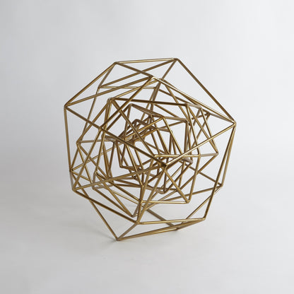 Geo Sculpture by Global Views in gold. Made from iron in a modern style.