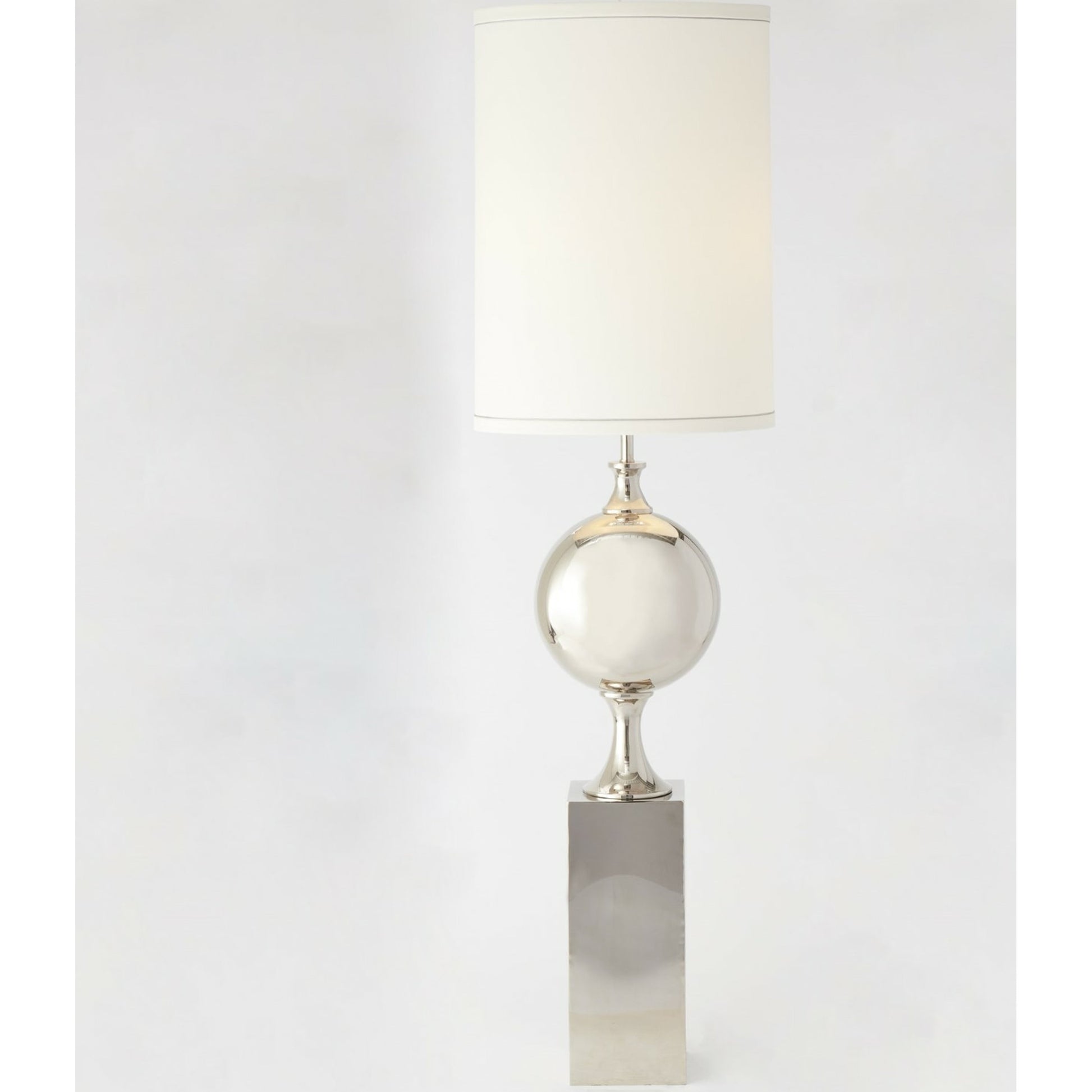 Big Pill Lamp by Global Views in nickel. Made from brass, stainless steel in a transitional style.
