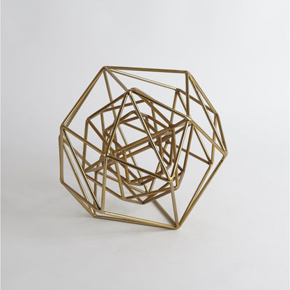 Geo Sculpture by Global Views in gold. Made from iron in a modern style.