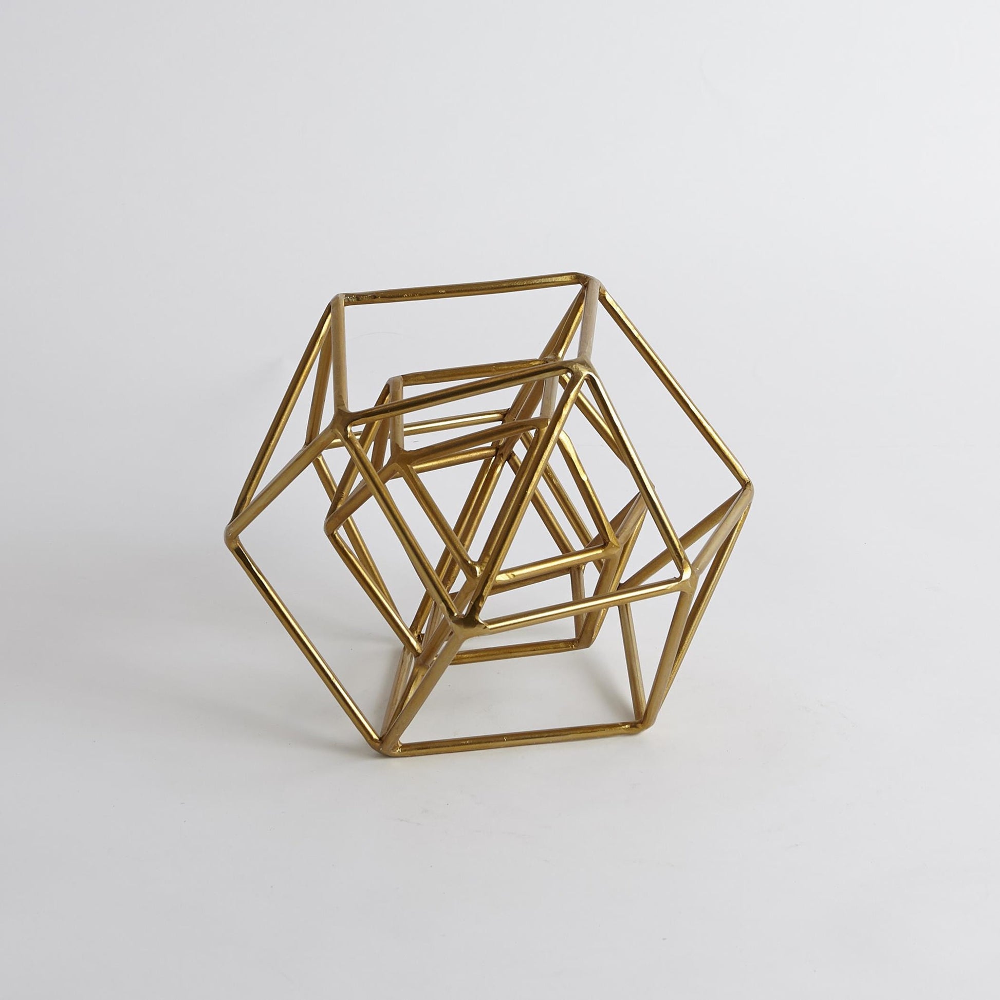 Geo Sculpture by Global Views in gold. Made from iron in a modern style.