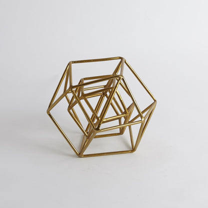 Geo Sculpture by Global Views in gold. Made from iron in a modern style.