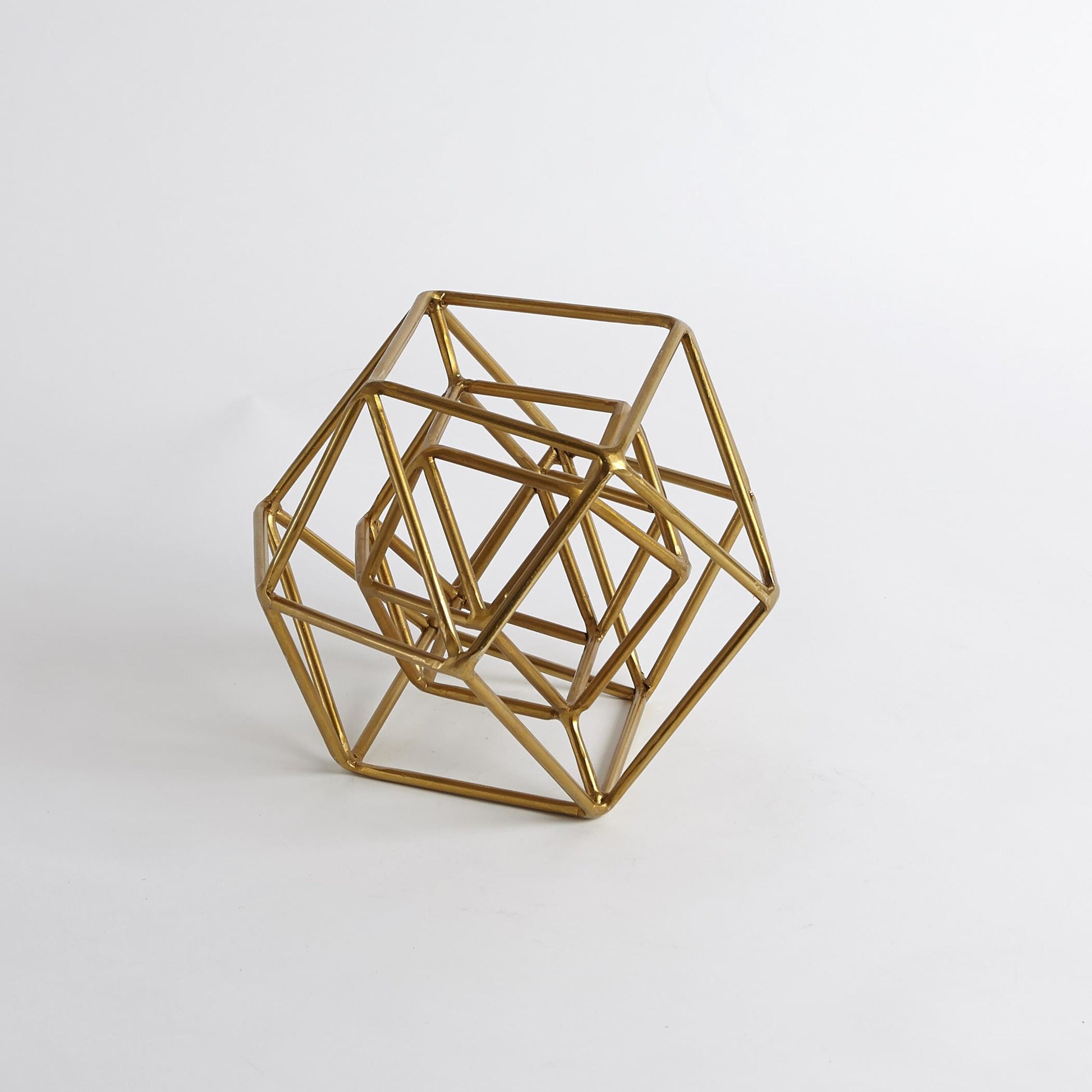 Geo Sculpture by Global Views in gold. Made from iron in a modern style.