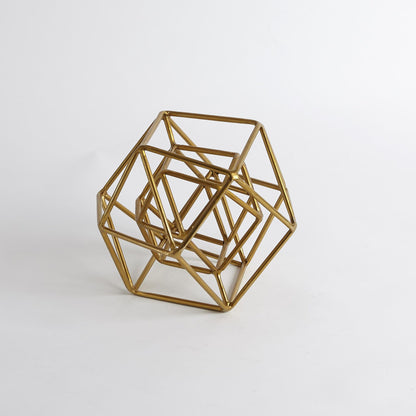 Geo Sculpture by Global Views in gold. Made from iron in a modern style.