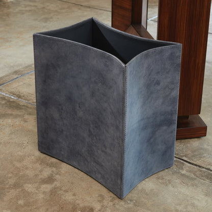 Folded Leather Wastebasket by Global Views. Made from leather in a modern style.