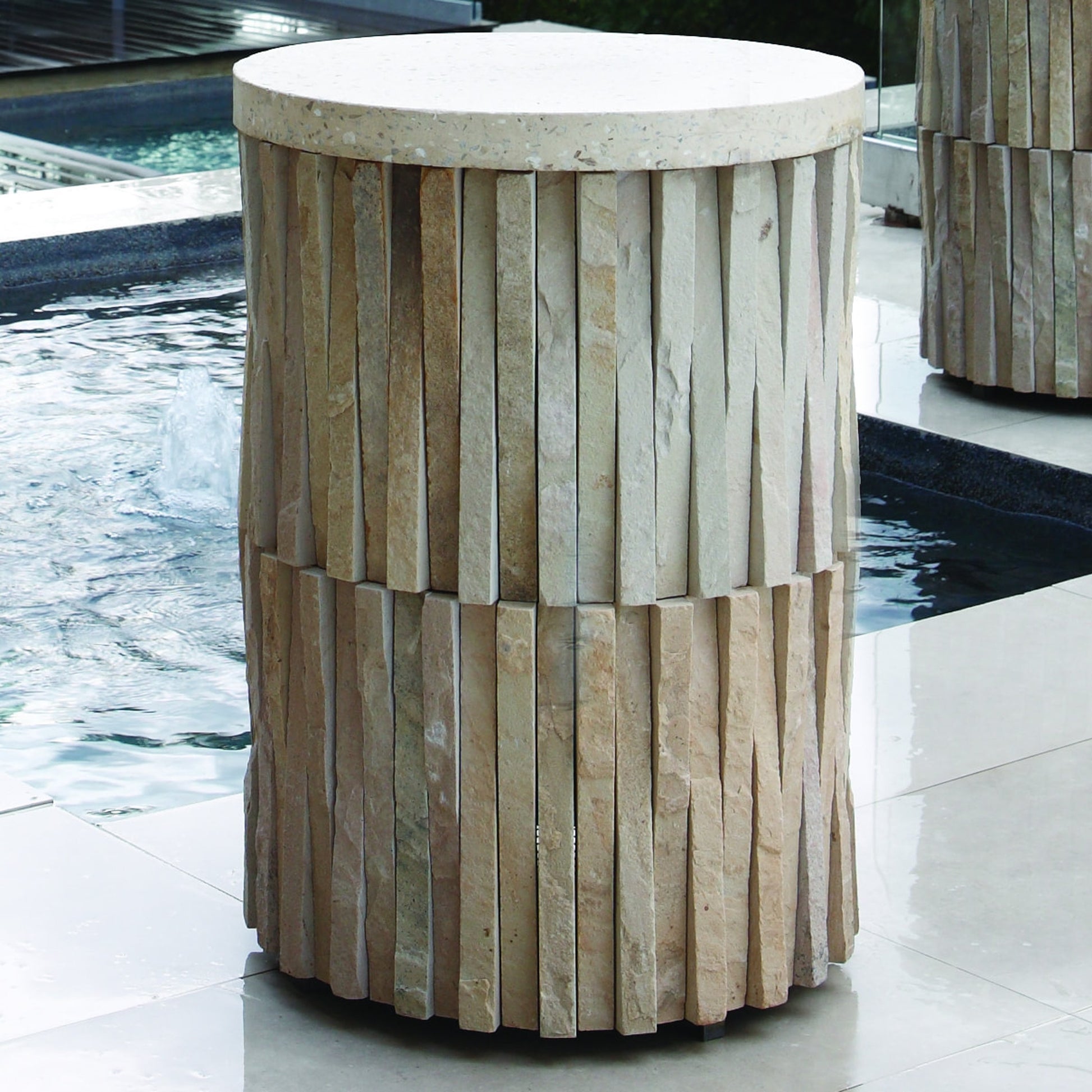 Round Teeter Totter Table by Global Views. Made from iron, hand sculpted chiseled stone from rajasthan in a eclectic & global style.