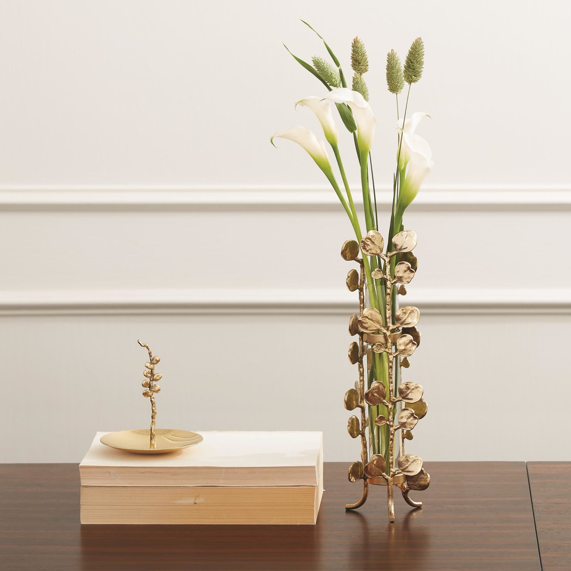 Bauhinia Bud Vase by Global Views. Made from brass, glass in a eclectic & global style.