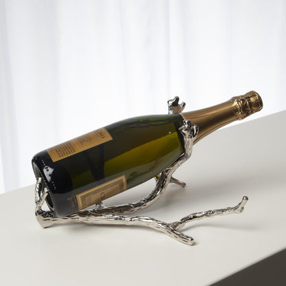 Twig Wine Bottle Holder by Global Views. Made from cast brass in a eclectic & global style.
