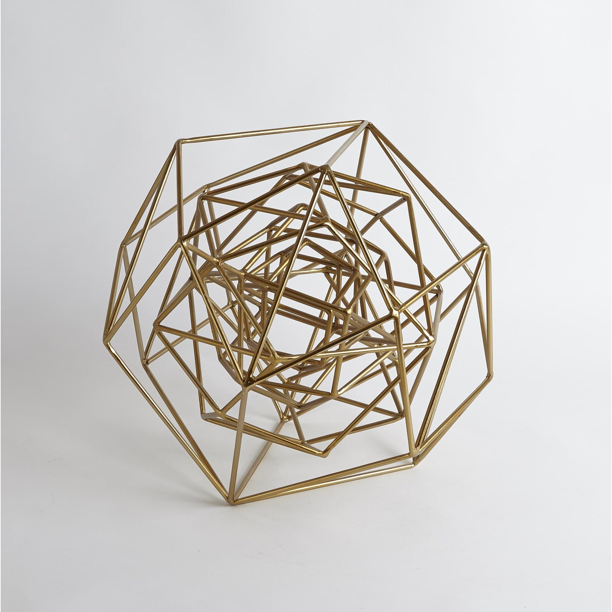 Geo Sculpture by Global Views in gold. Made from iron in a modern style.