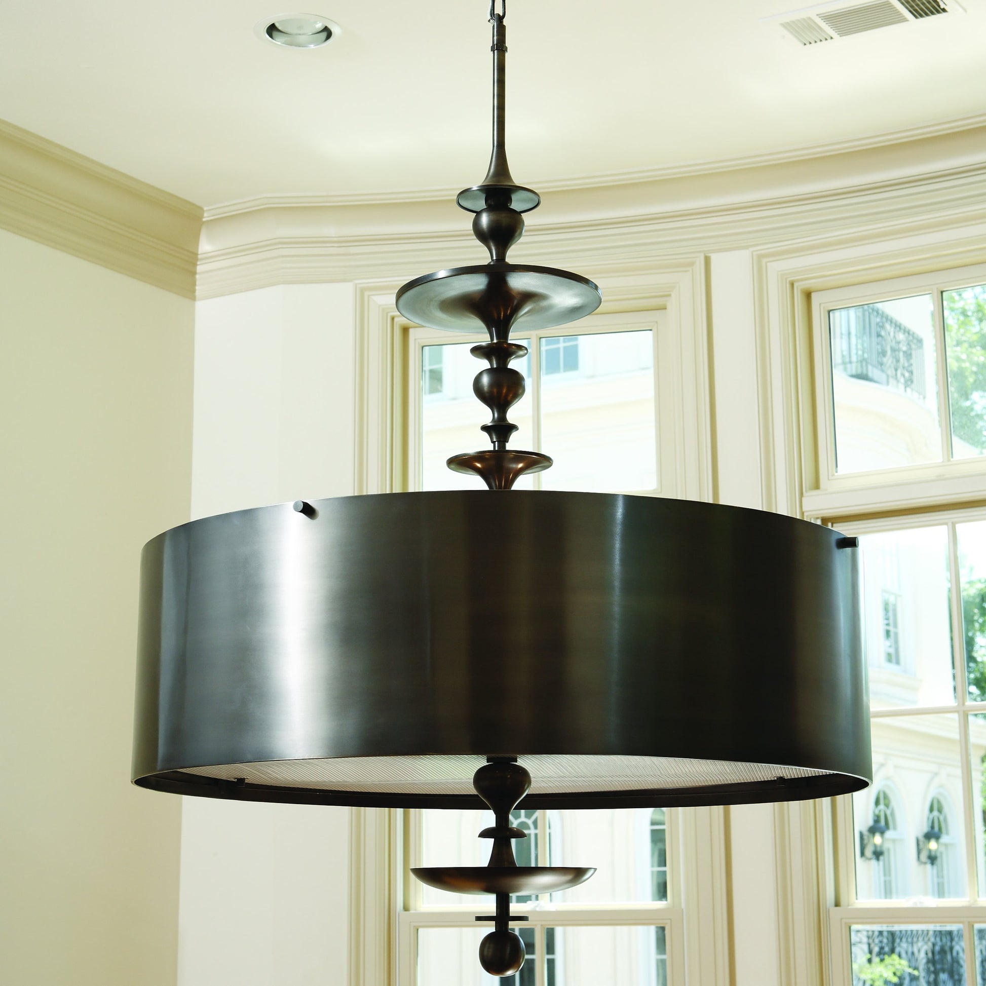 Turned Pendant Chandelier by Global Views in nickel. Made from unique in a transitional style.