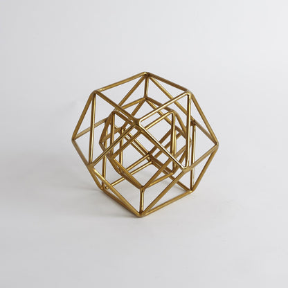 Geo Sculpture by Global Views in gold. Made from iron in a modern style.