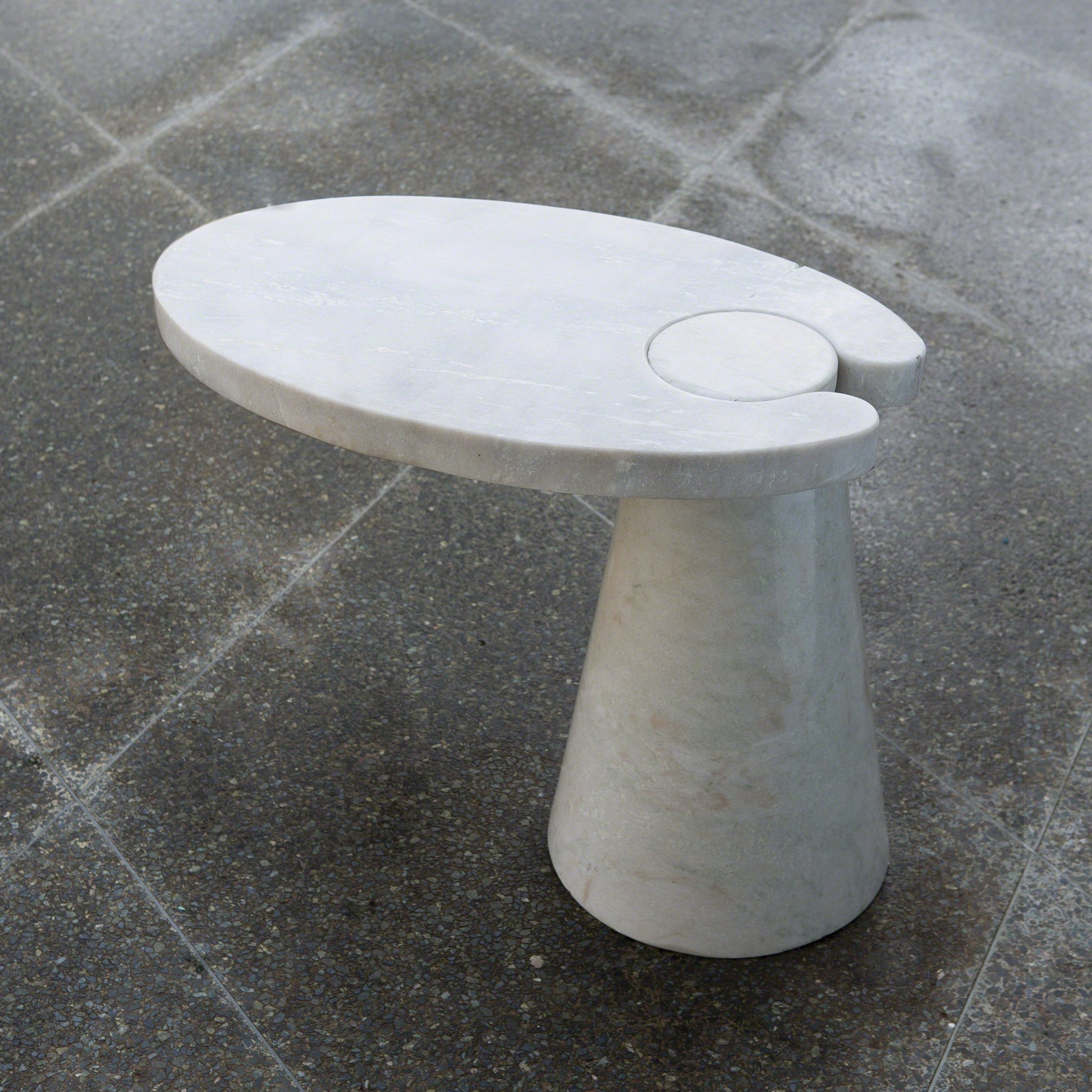 Cone Cantilever Table by Global Views. Made from honed white marble in a eclectic & global style.