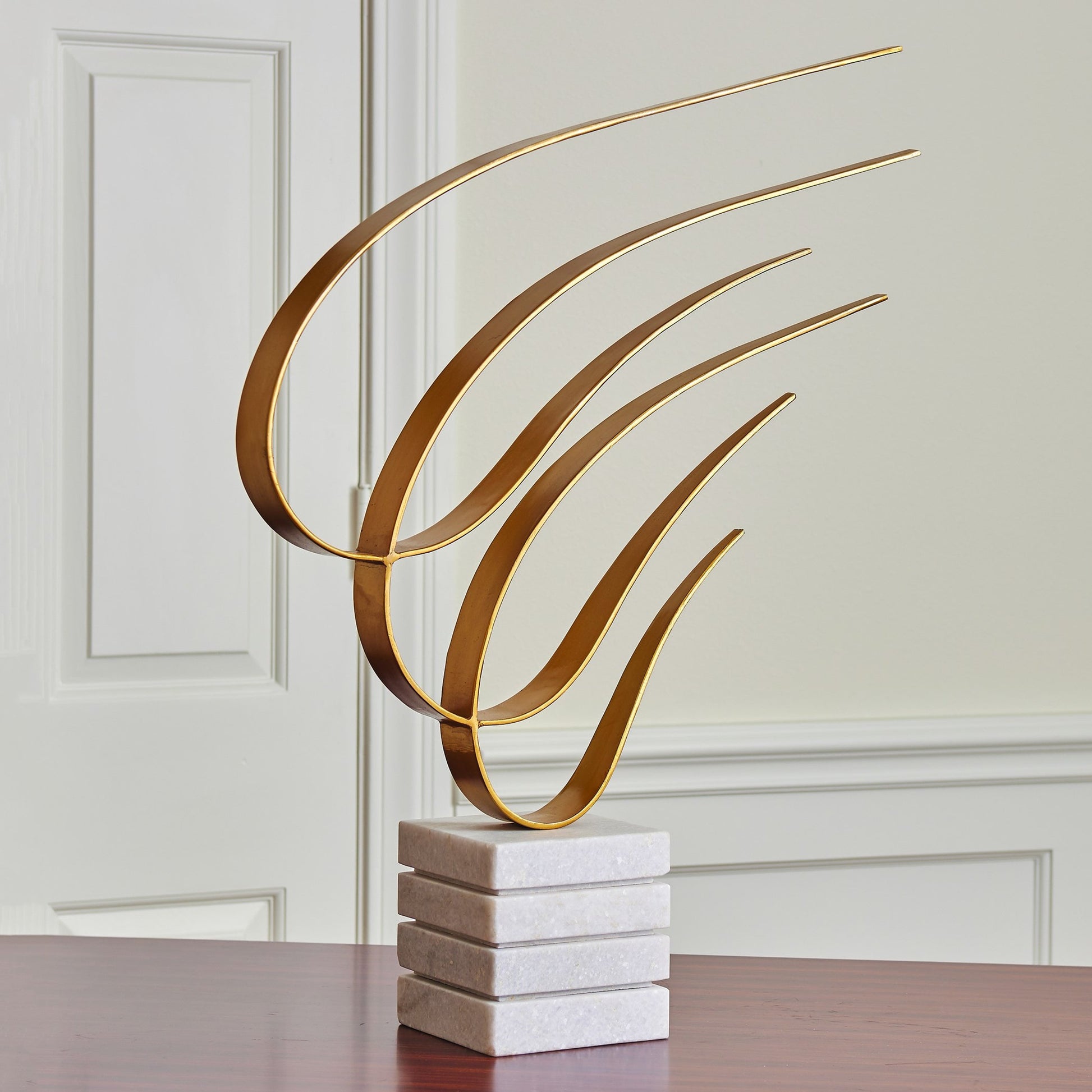 Swoosh Sculpture by Global Views. Made from unique in a eclectic & global style.