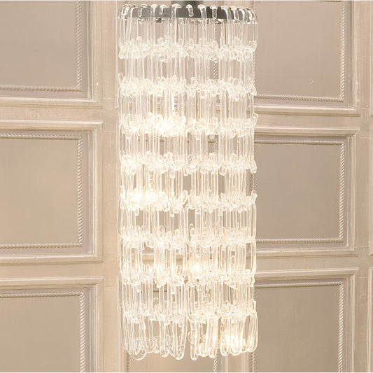 C Chandelier by Global Views. Made from glass in a eclectic & global style.