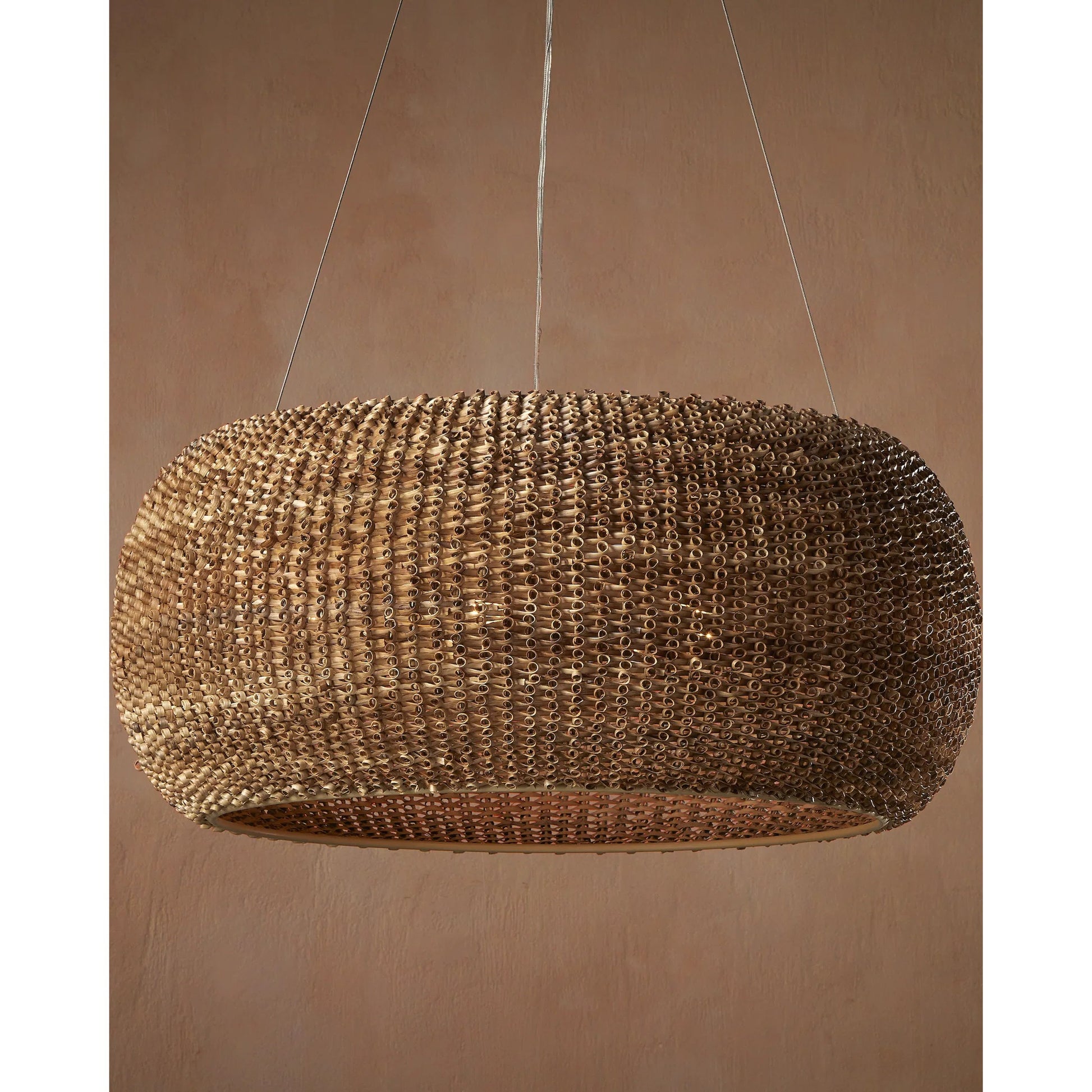 Boucle Chandelier by Currey and Company in natural, beige. Made from rattan, wrought iron in a rustic style.