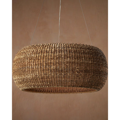 Boucle Chandelier by Currey and Company in natural, beige. Made from rattan, wrought iron in a rustic style.