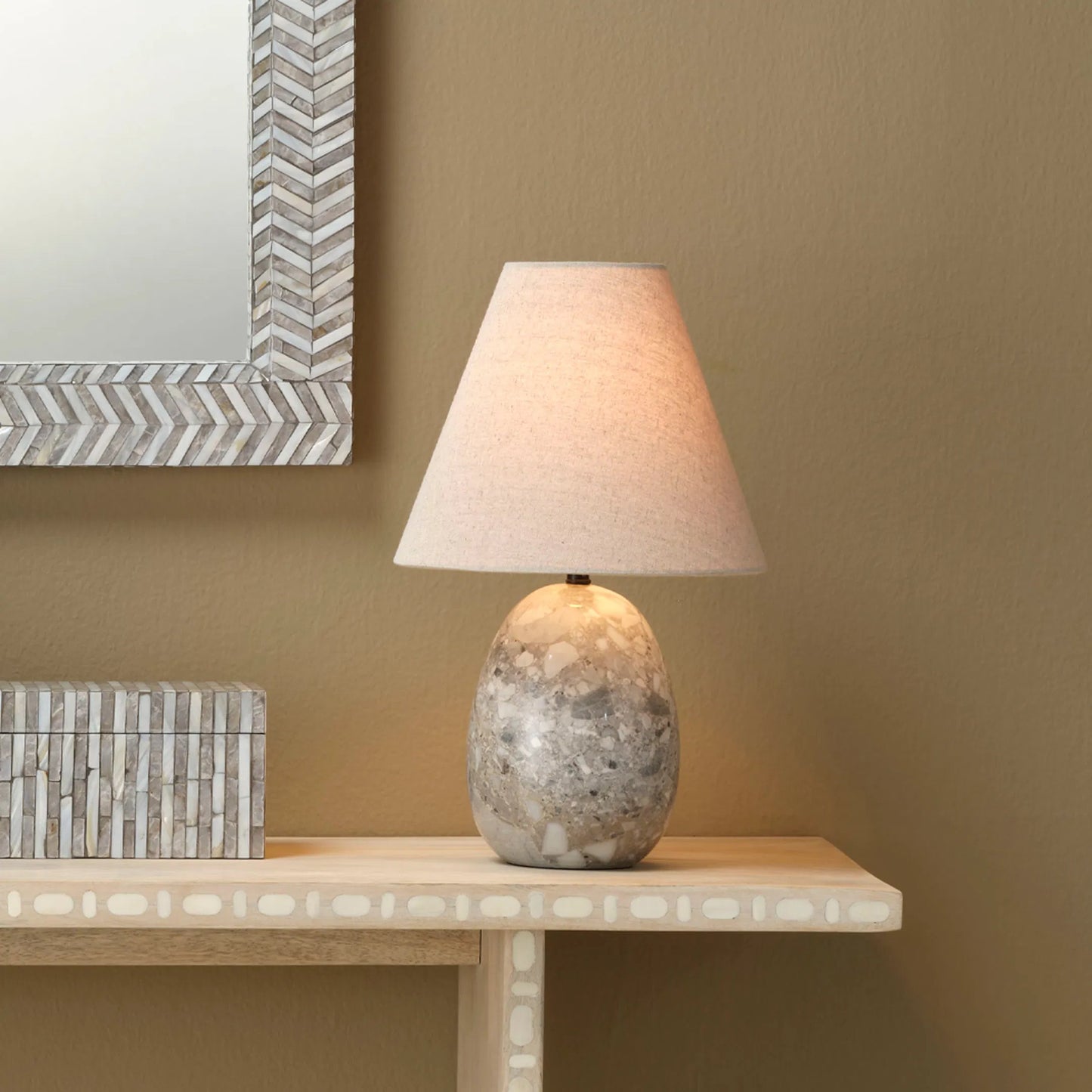 004 SI-2249036 | Lifestyle | Capsule Travertine Table Lamp by Jamie Young in grey and grey travertine stone. Made from travertine in a modern style.