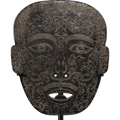 Han Dynasty Jade Medicine Mask by Currey and Company in bronze, black. Made from stoneware, metal in a eclectic & global style.