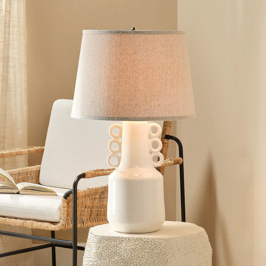 Circus Table Lamp by Jamie Young in white ceramic. Made from ceramic in a traditional style.