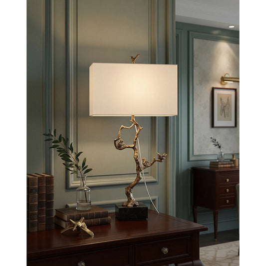 Shadows Table Lamp by Currey and Company in antique brass, black. Made from aluminum, stone in a transitional style.