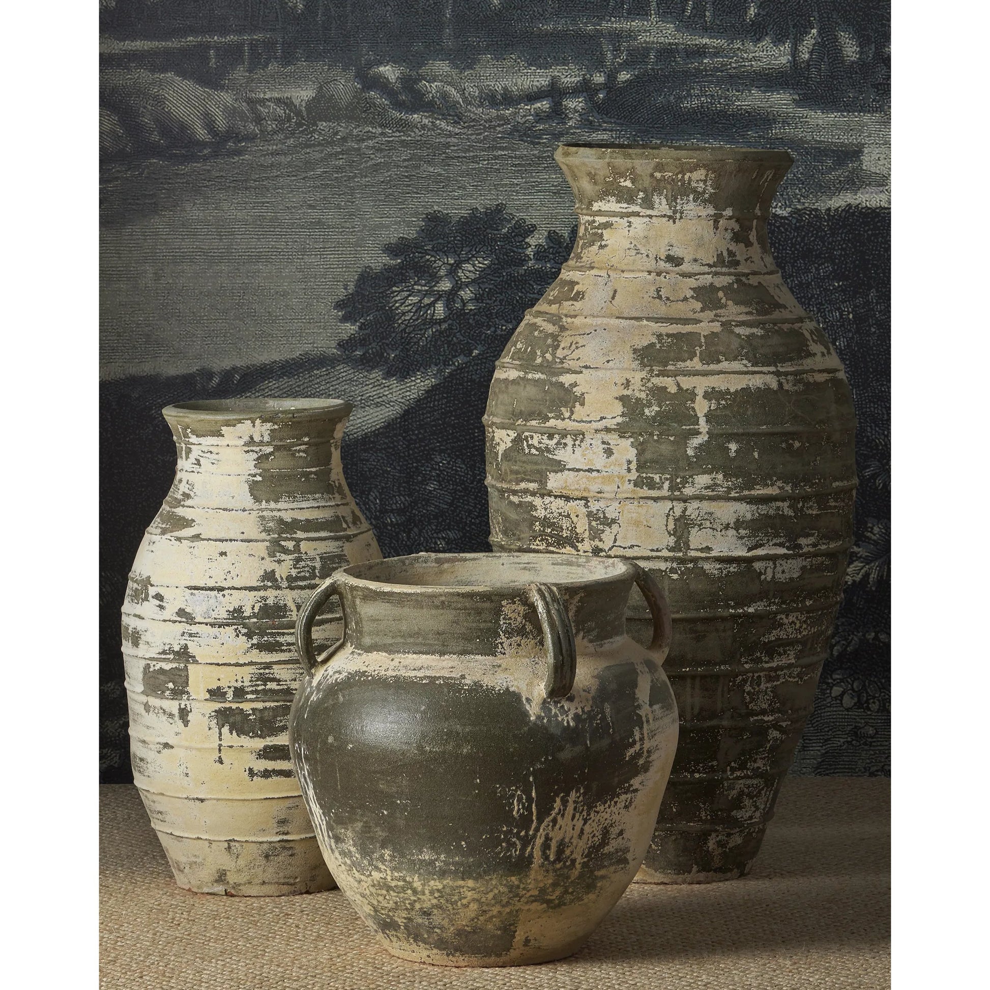 Ragusa Urn by Currey and Company. Made from terracotta in a rustic style.