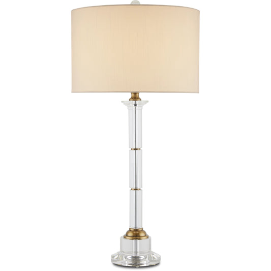 Lothian Table Lamp by Currey and Company in clear, antique brass. Made from optic crystal, metal in a transitional style.