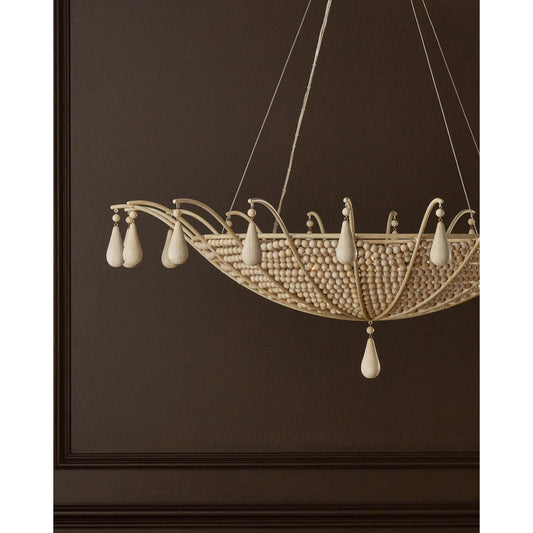 Korg Chandelier by Currey and Company in sandstone. Made from wood beads, wrought iron in a cottage & farmhouse style.