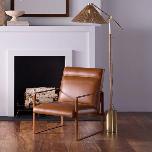 Fitzgerald Floor Lamp by Jamie Young in natural and brushed brass. Made from jute in a unique style.