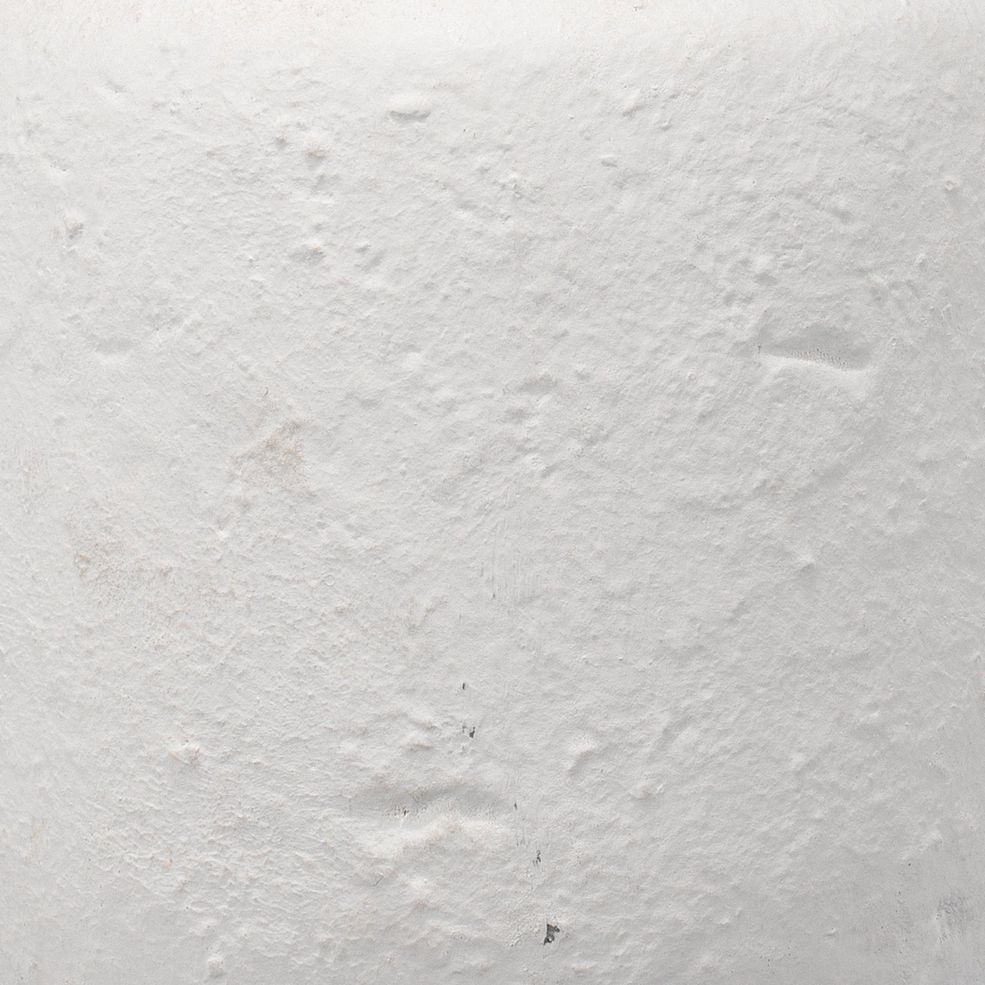 Gilbert Table Lamp by Jamie Young in textured matte white. Made from cement in a coastal style.
