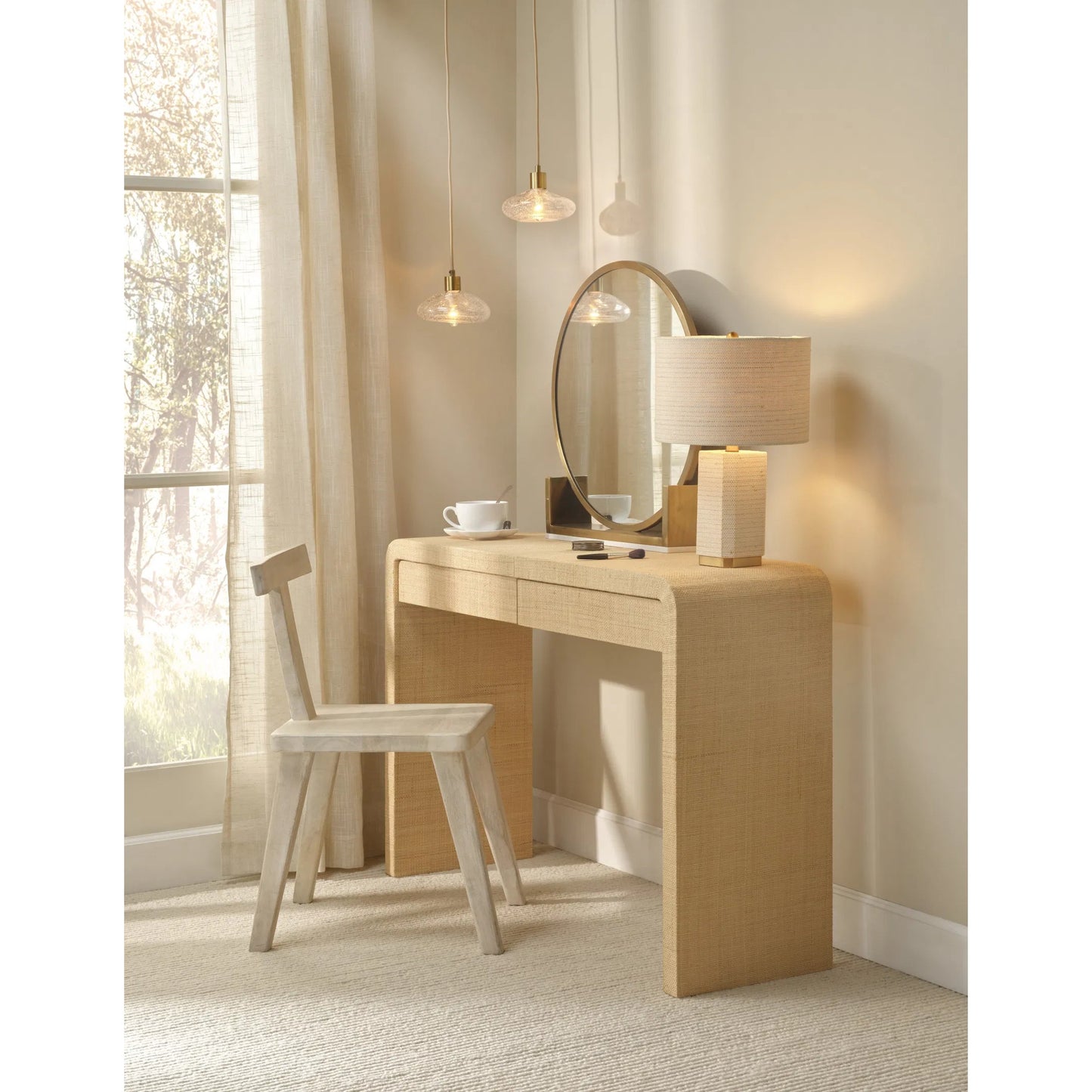 002 SI-2531168 | Lifestyle | Haisley Table Lamp by Jamie Young in natural and bleached raffia. Made from raffia in a unique style.