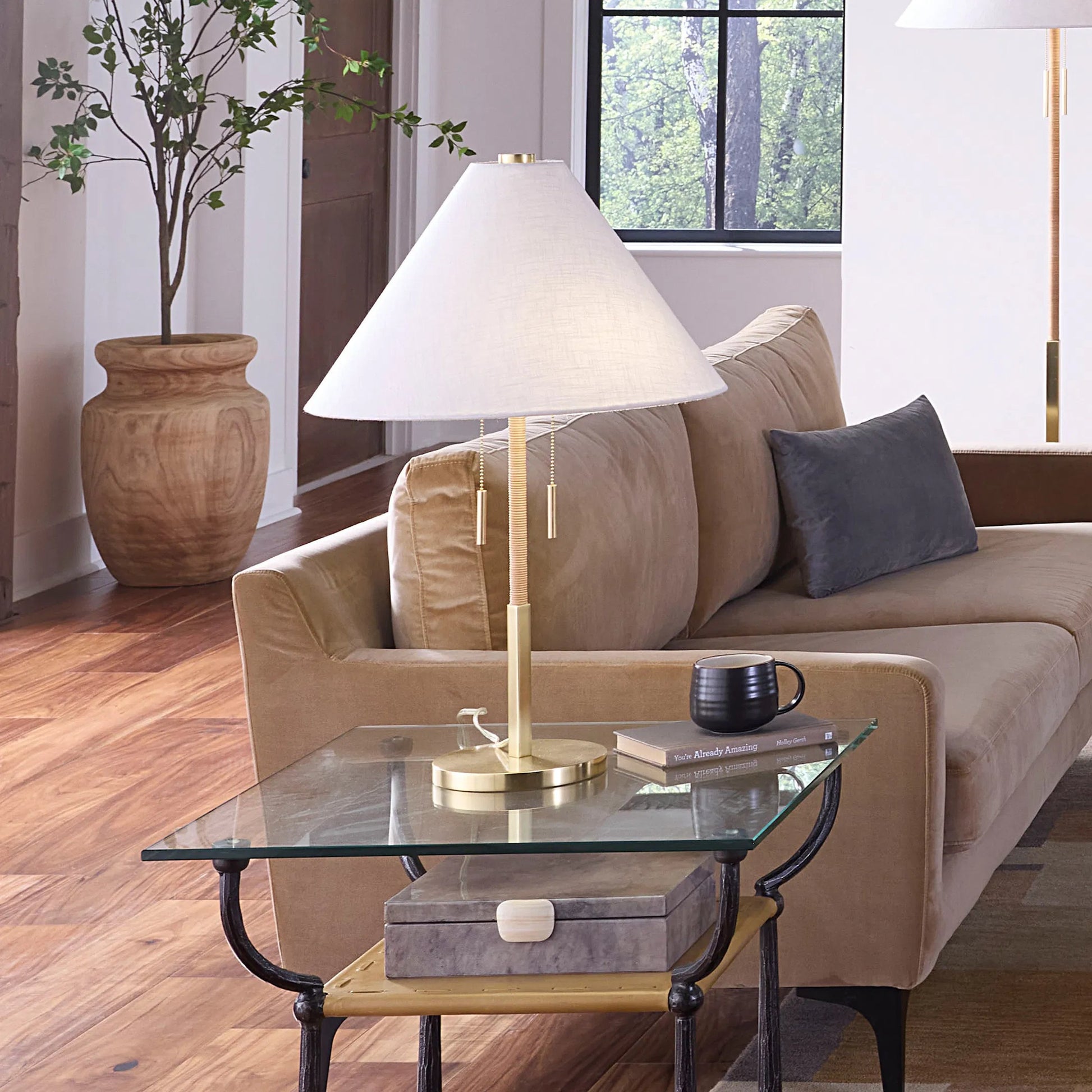 Harrison Table Lamp by Jamie Young in natural and brushed brass. Made from rattan in a unique style.