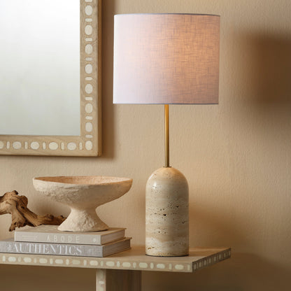 Holt Travertine Table Lamp by Jamie Young in brown. Made from travertine, metal: iron in a modern style.