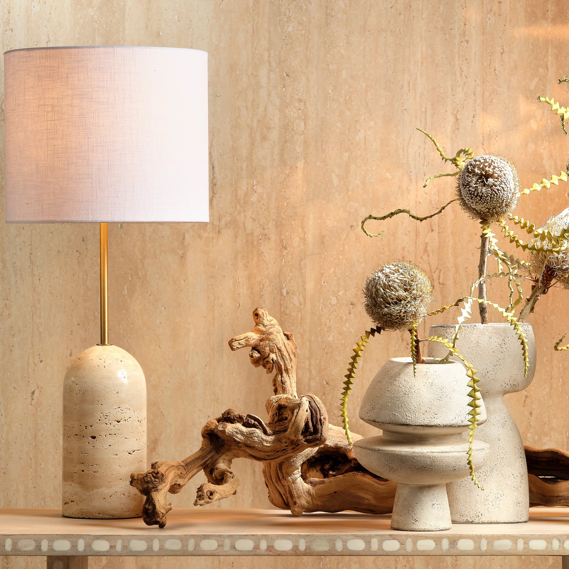 Holt Travertine Table Lamp by Jamie Young in brown. Made from travertine, metal: iron in a modern style.