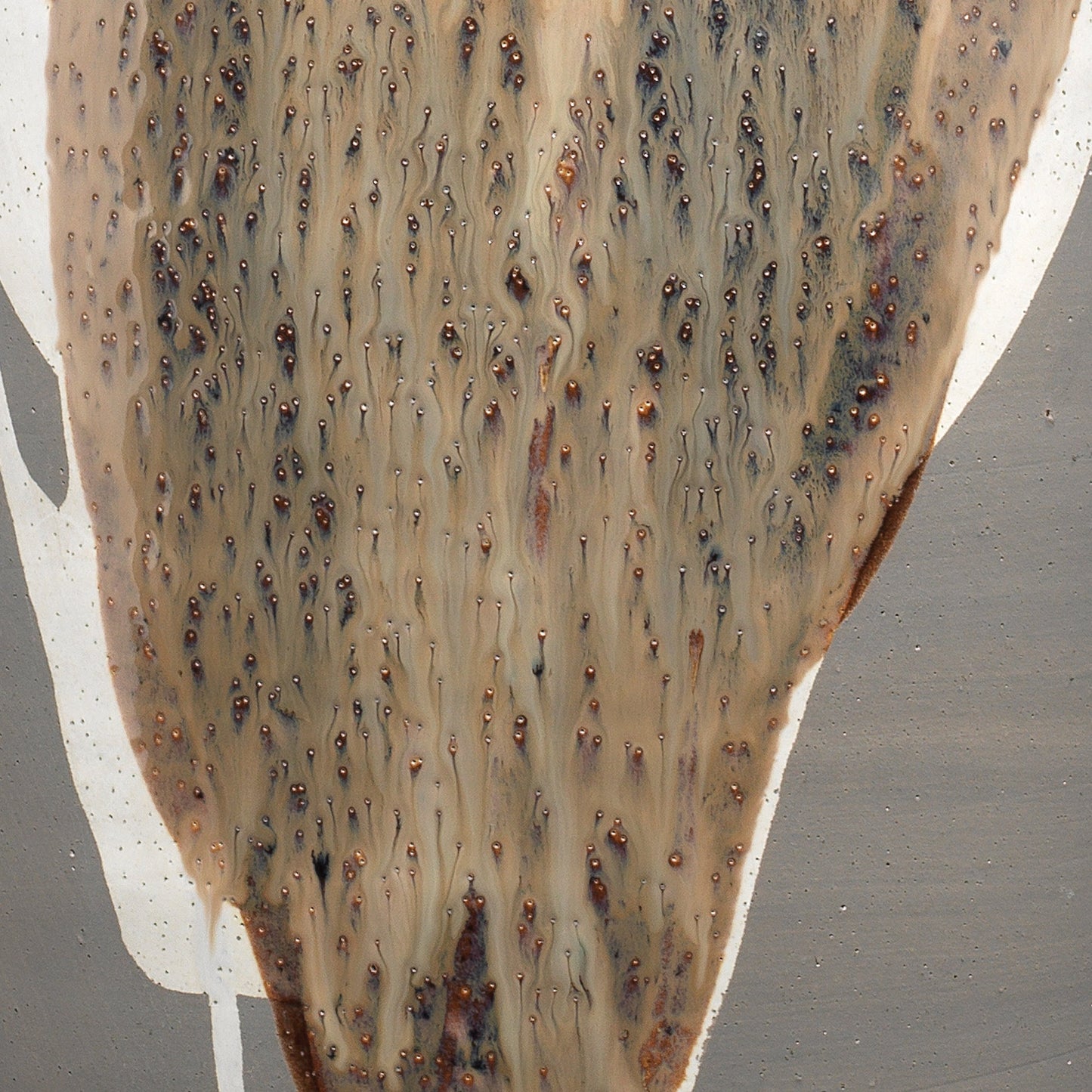 004 SR-819680 | Closeup | Landslide Table Lamp by Jamie Young in matte gray with beige, white drip. Made from ceramic in a eclectic & global style.