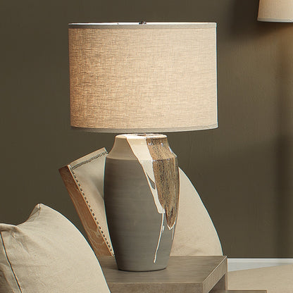 Landslide Table Lamp by Jamie Young in matte gray with beige, white drip. Made from ceramic in a eclectic & global style.