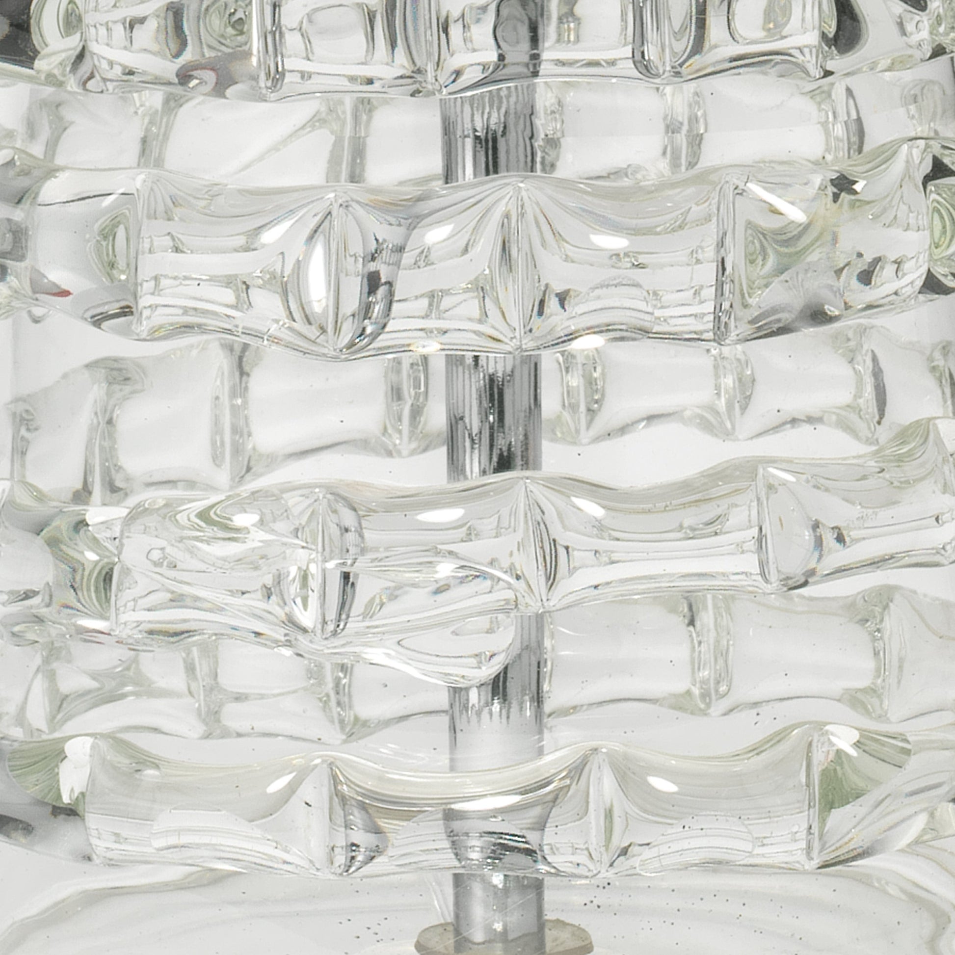 Ribbon Table Lamp by Jamie Young in clear glass. Made from glass in a modern style.
