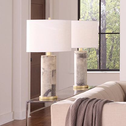 Rivet Table Lamp by Jamie Young in grey and grey vellum. Made from vellum in a unique style.