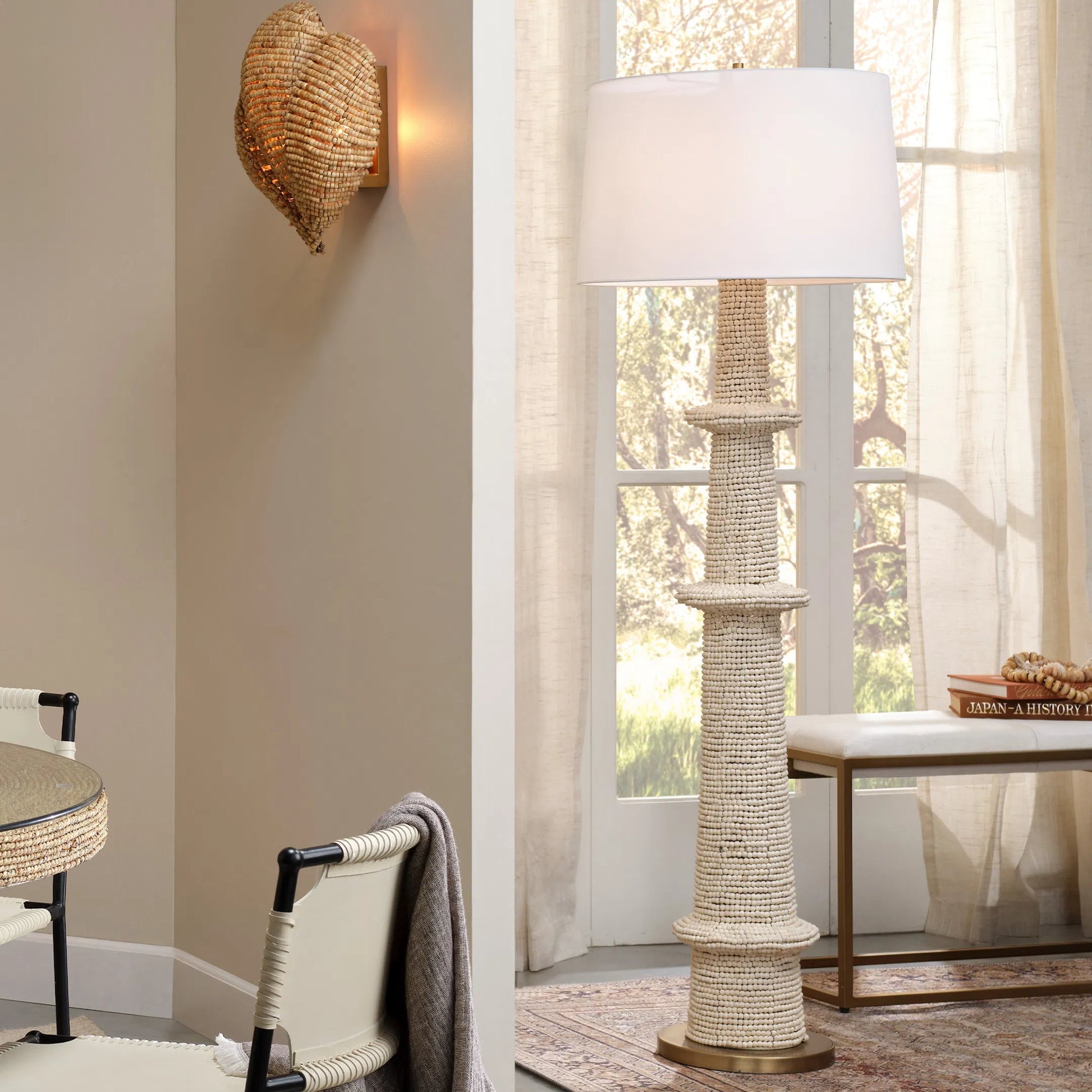 Rowan Floor Lamp by Jamie Young. Made from wood in a unique style.