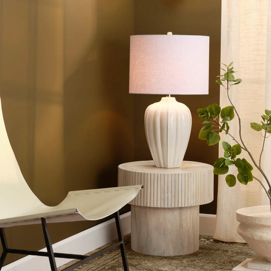 Seraphina Table Lamp by Jamie Young in light cream. Made from ceramic in a modern style.