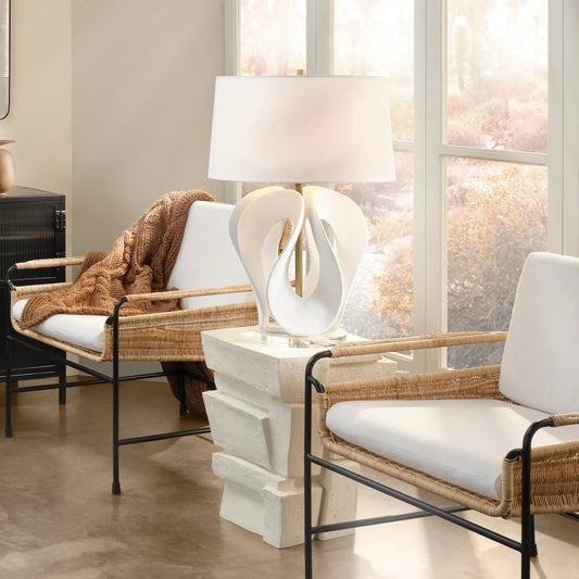 Swan Table Lamp by Jamie Young in white and antique brass. Made from resin in a unique style.