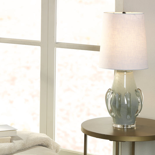 Talon Table Lamp by Jamie Young in cornflower blue. Made from glass, acrylic in a coastal style.